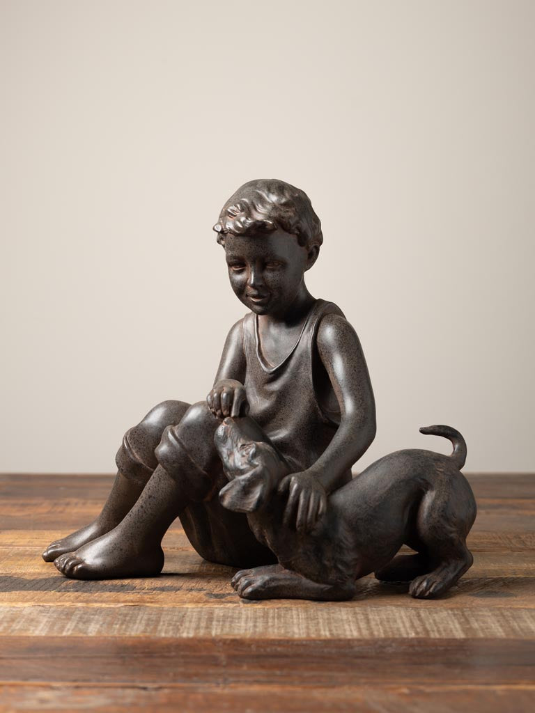 Seated Boy with Dogn in Resin