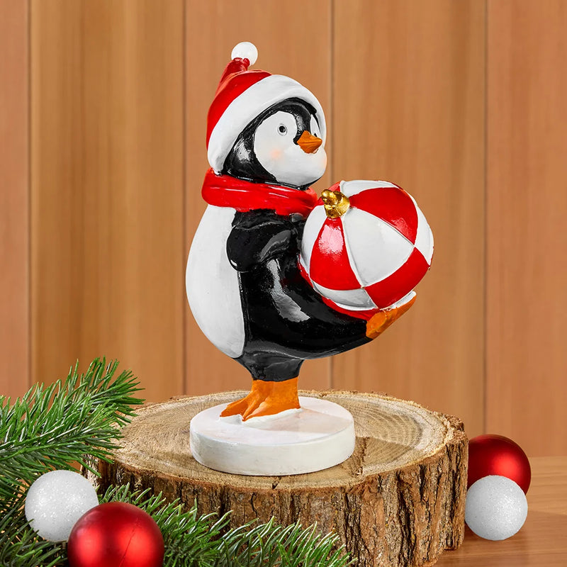 The Festive Penguin w Red and white Christmas Ball