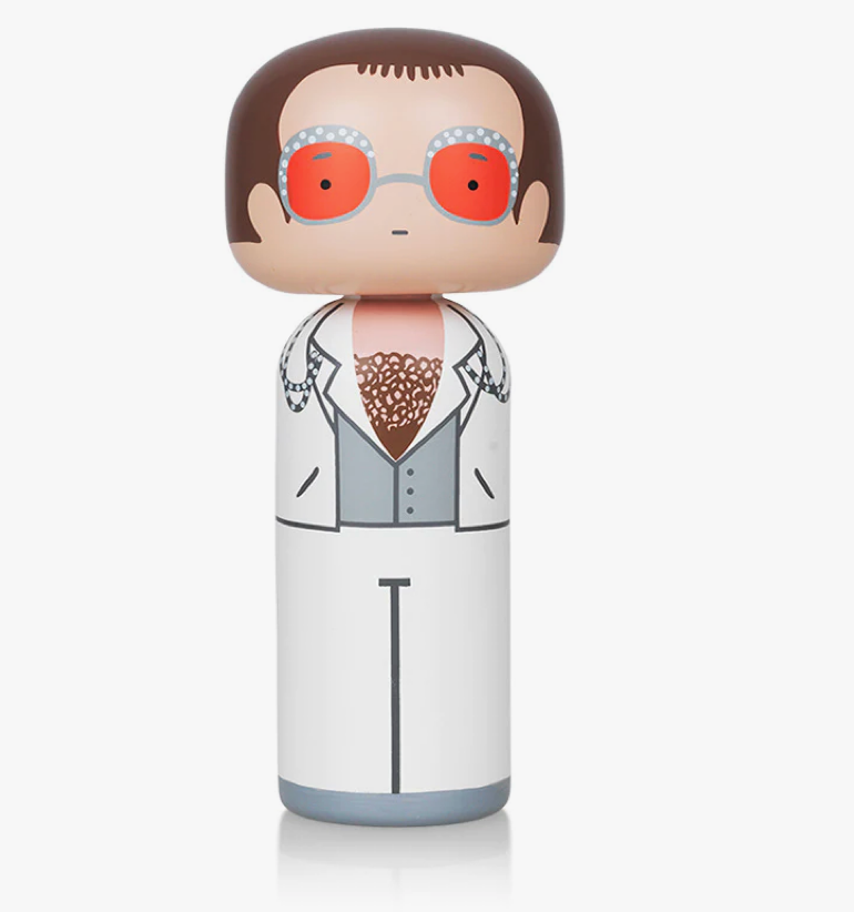 Elton in white outfit